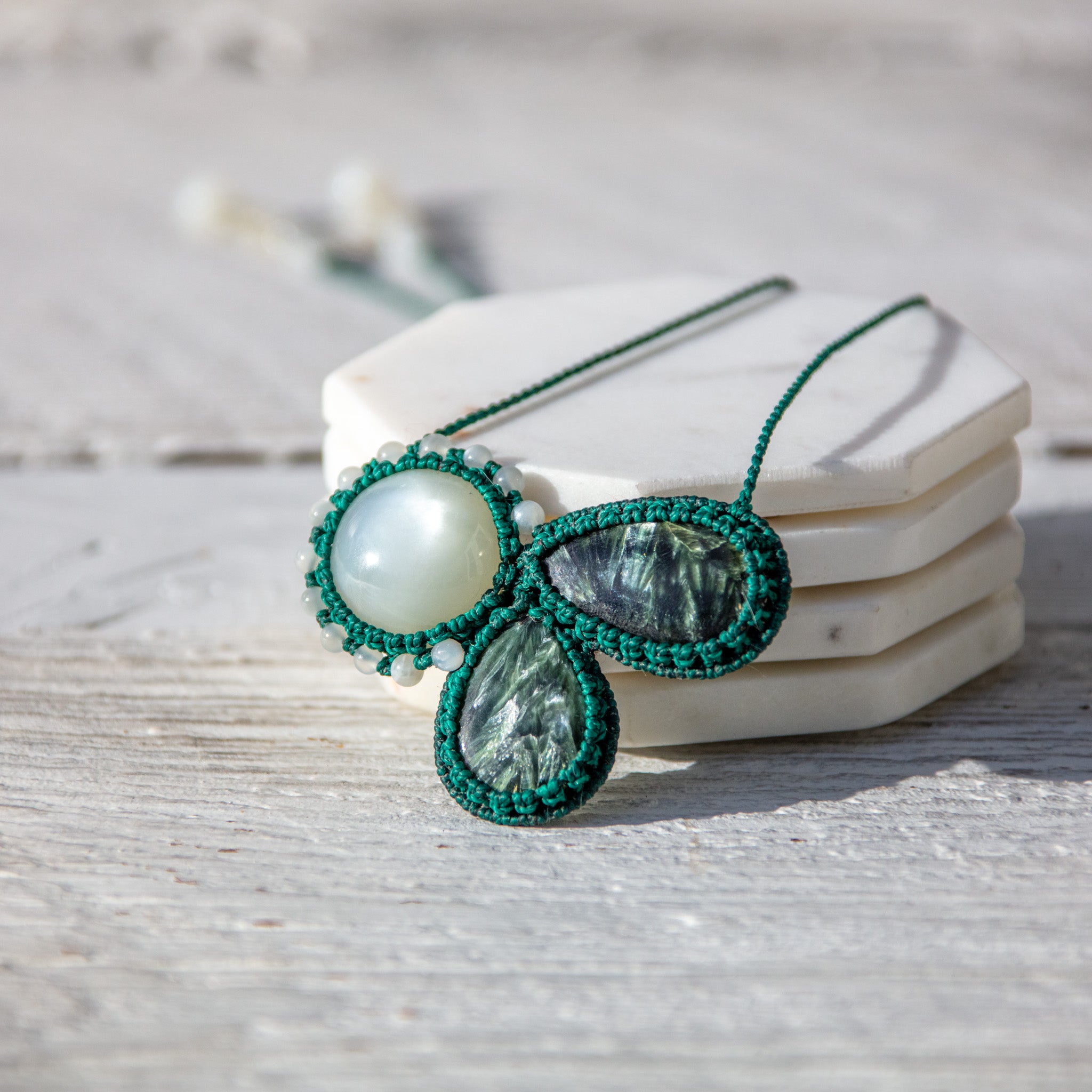 silhouette of the spirit accomplices necklace
